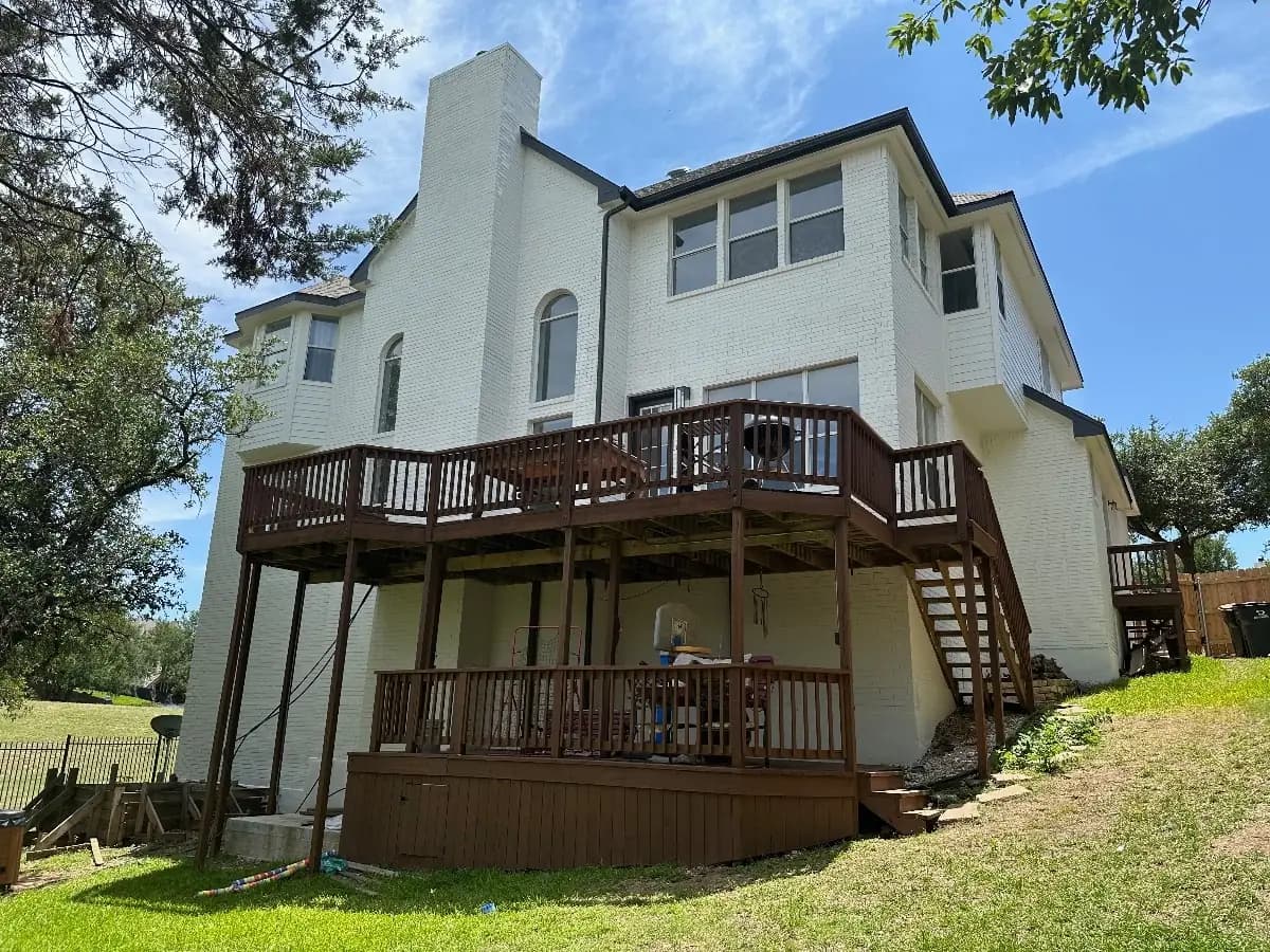 Stucco home exterior with raised deck by Ranger Painting